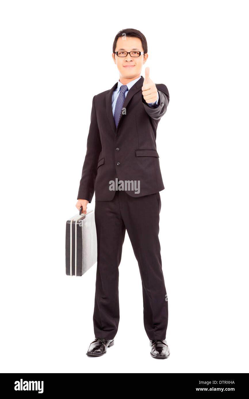 happy businessman holding briefcase and  thumb up in studio Stock Photo