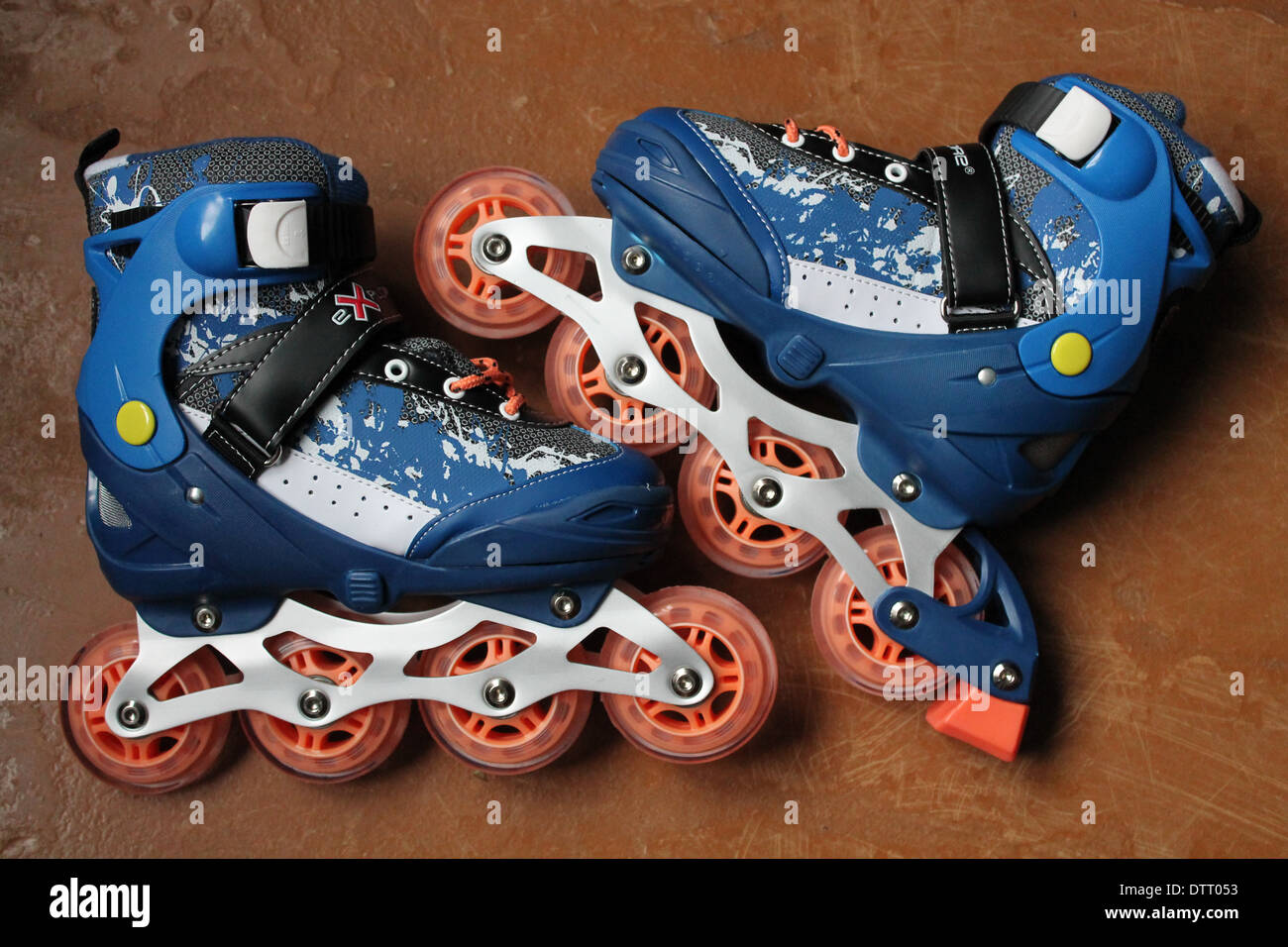 pair of fast blue rollerskates on the chrome wheels Stock Photo Alamy
