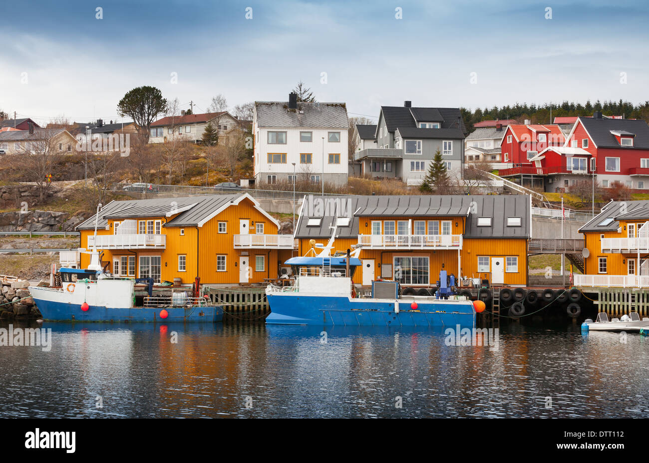 Norwegian fishing village with wooden houses on the coast Stock Photo ...