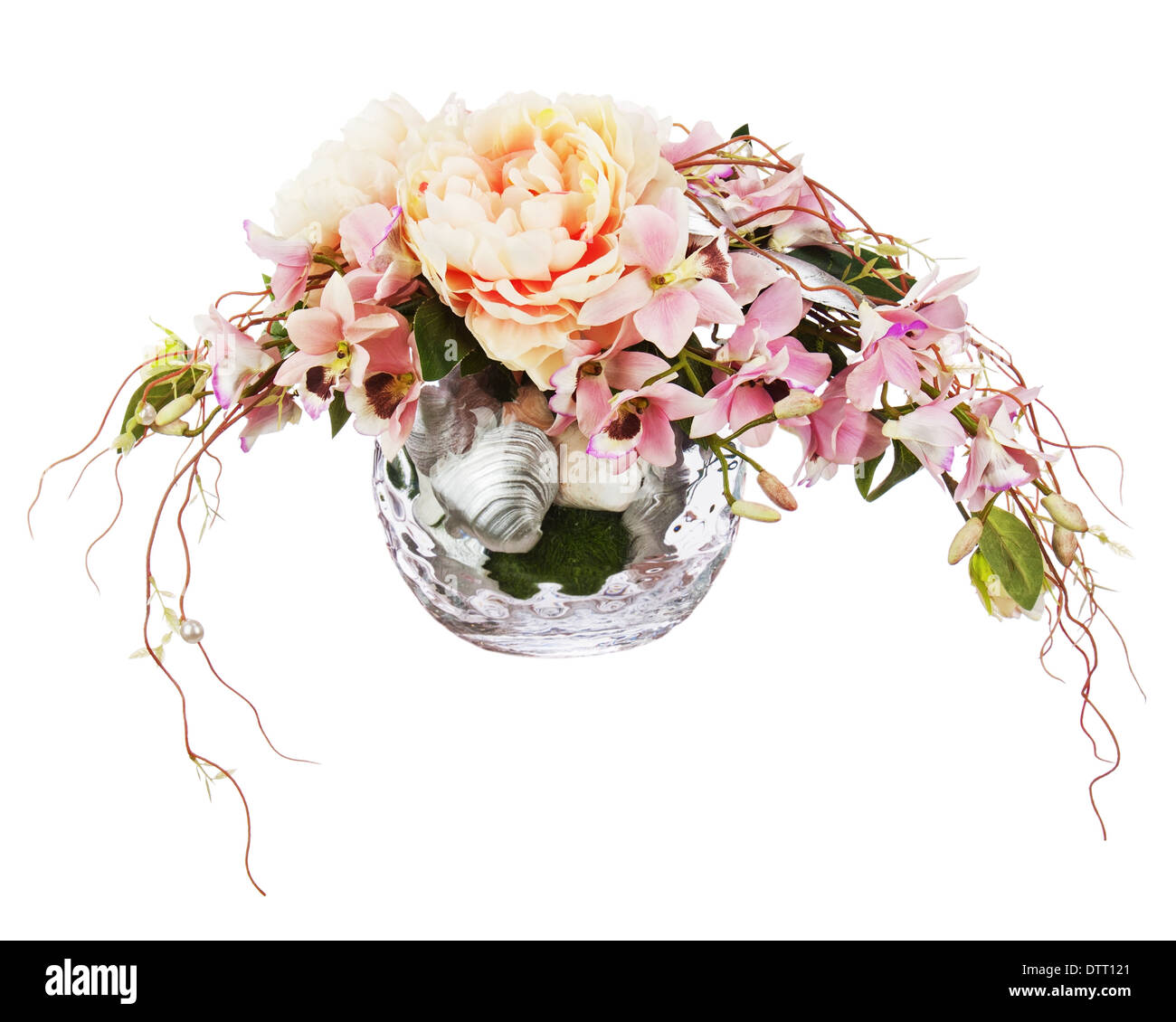 Bouquet from peon flowers and orchids in glass vase isolated on white background. Closeup. Stock Photo