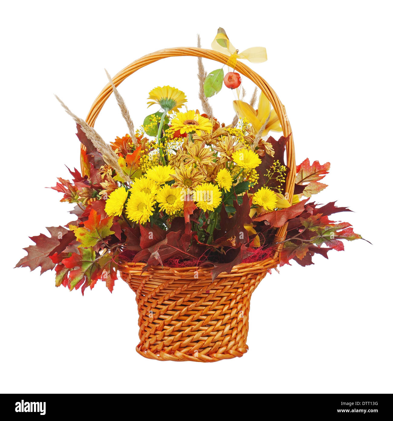 Bouquet arrangement centerpiece in wicker basket isolated on white background. Closeup. Stock Photo
