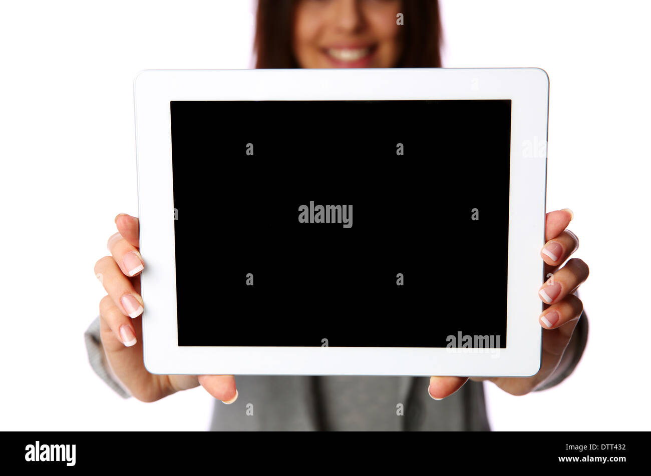 Woman showing tablet computer screen isolated on white background Stock Photo