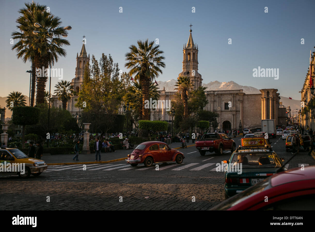 Arequipa - peru - view from hotel with reddish/ orange light from the sunset - cathedral and main square -  car passing by Stock Photo