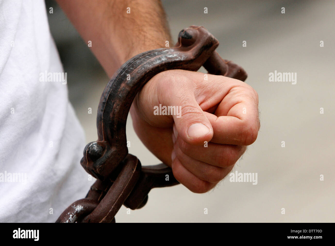 Amnesty International campaigner with shackles in London Stock Photo