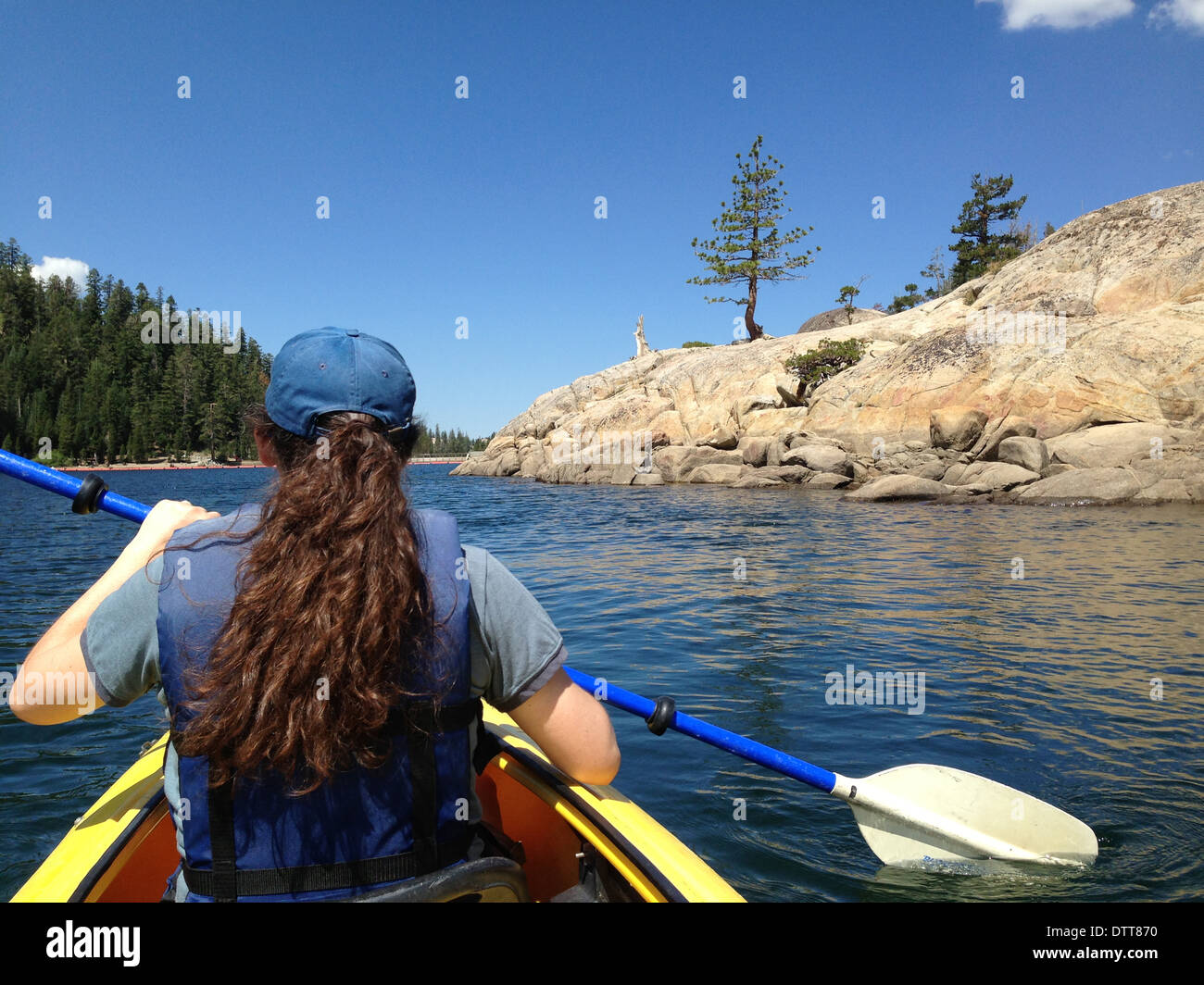 Woman rowing kayak in lake - Smartphone Captured Stock Image