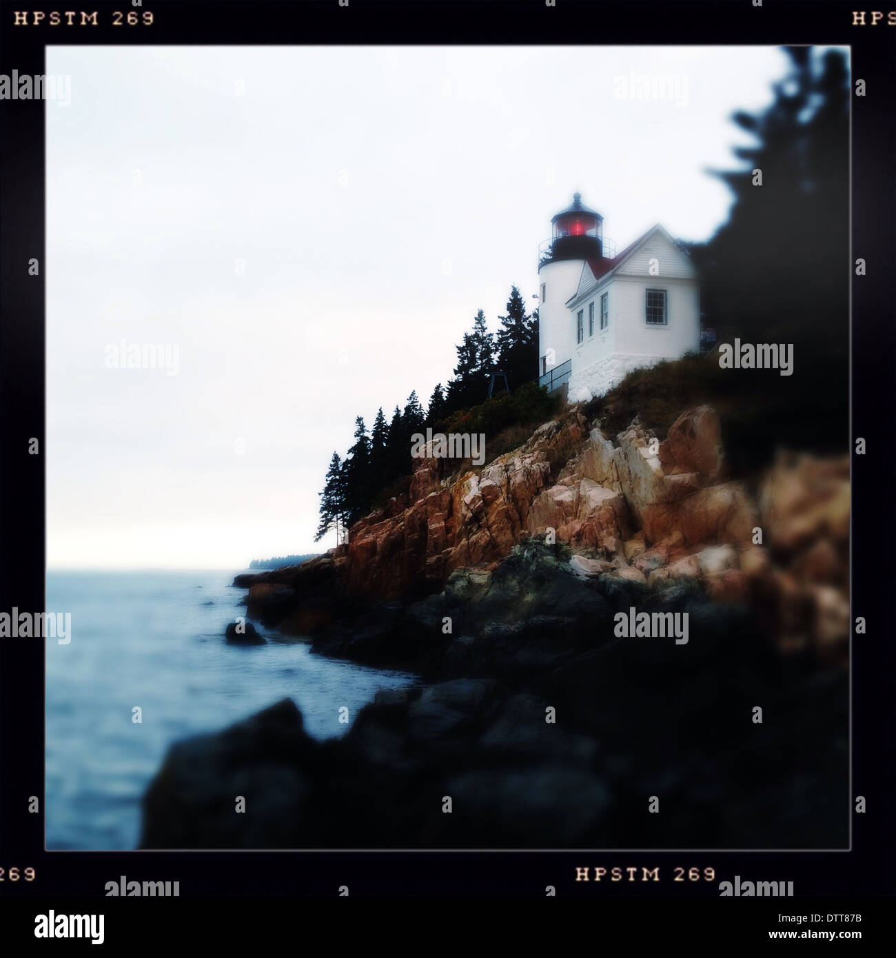 Lighthouse overlooking rocky coastline, Bass Harbor, Maine, United States - Smartphone Captured Stock Image