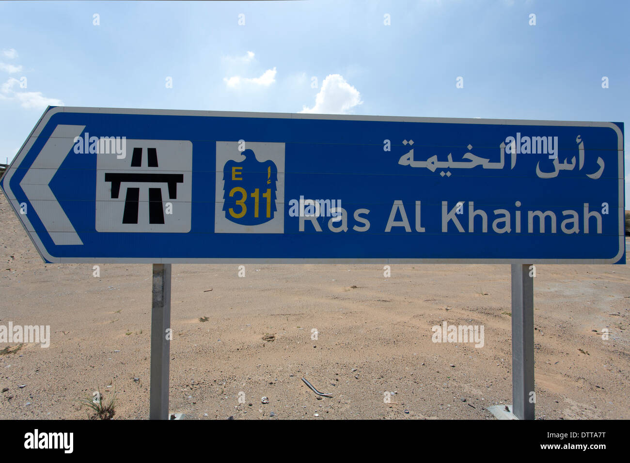 A road sign to Ras Al Khaimah in the desert in the UAE Stock Photo Alamy