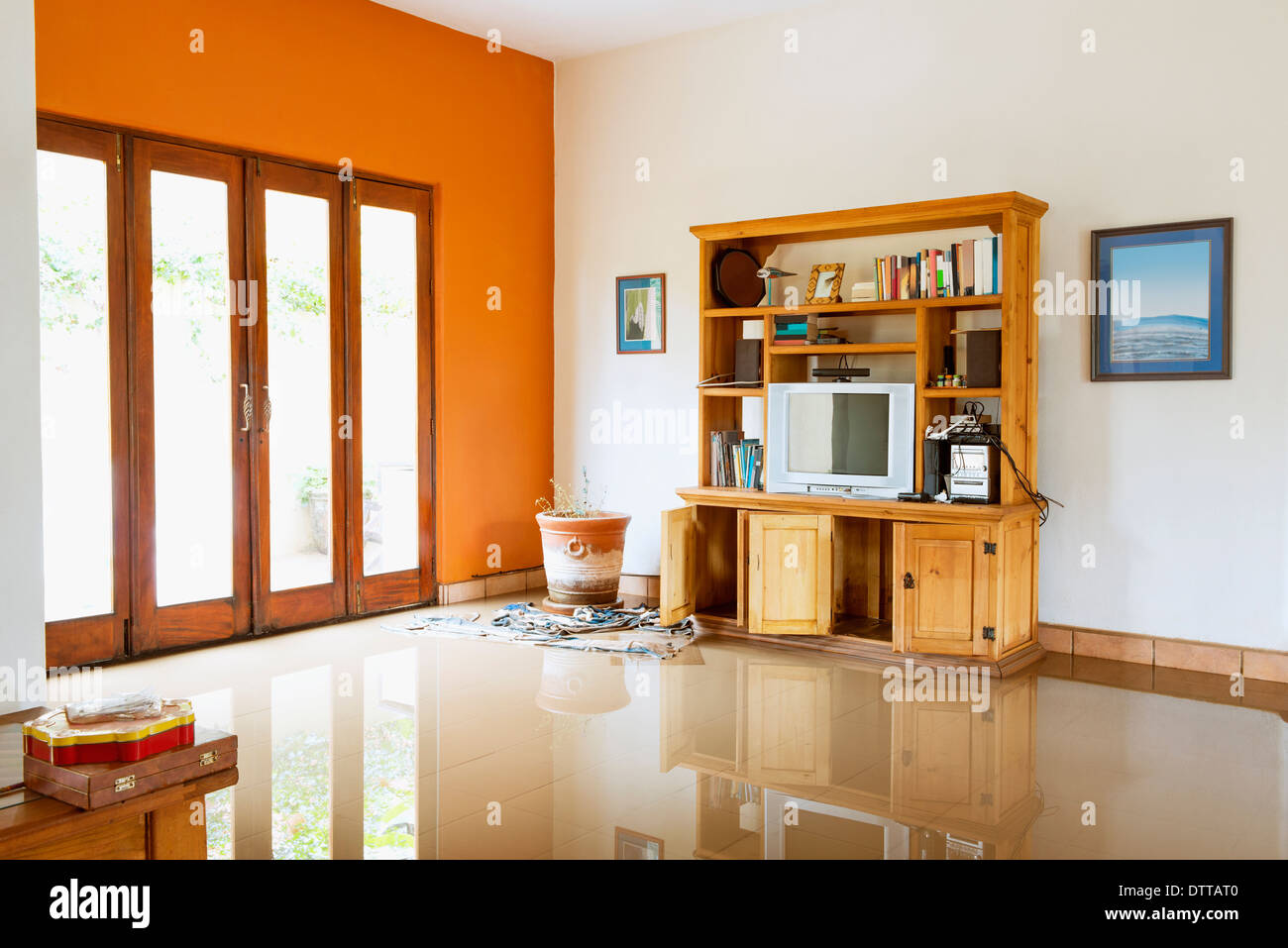 Media center and windows of flooded house Stock Photo