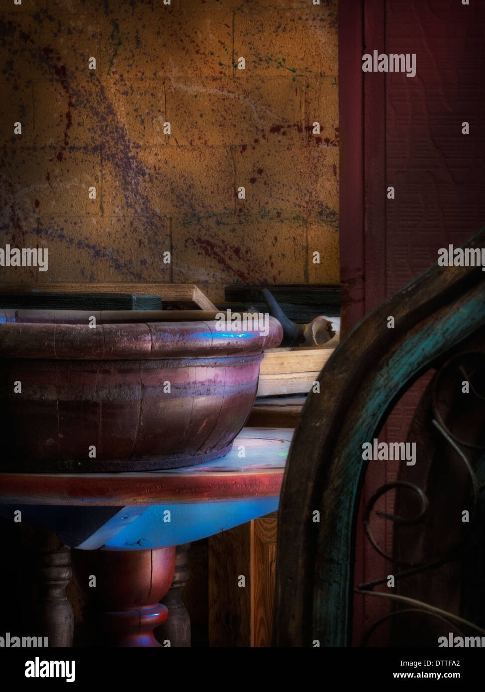 An editorial image of wooden bowls and furniture at a resale and garden shop in Cave Creek