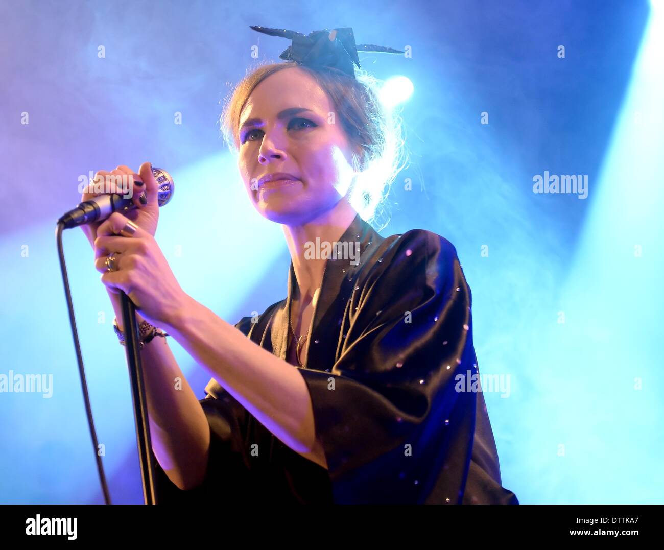 Berlin, Germany. 23rd Feb, 2014. Swedish singer Nina Persson performs on stage at Heimathafen in Berlin, Germany, 23 February 2014. She presented her new album 'Animal Heart'. Photo: Britta Pedersen/dpa/Alamy Live News Stock Photo