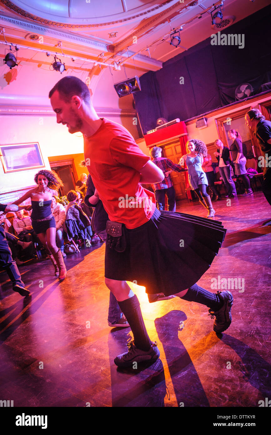 People dancing to Annasach Ceilidh Band at a ceilidh in Edinburgh, Scotland Stock Photo
