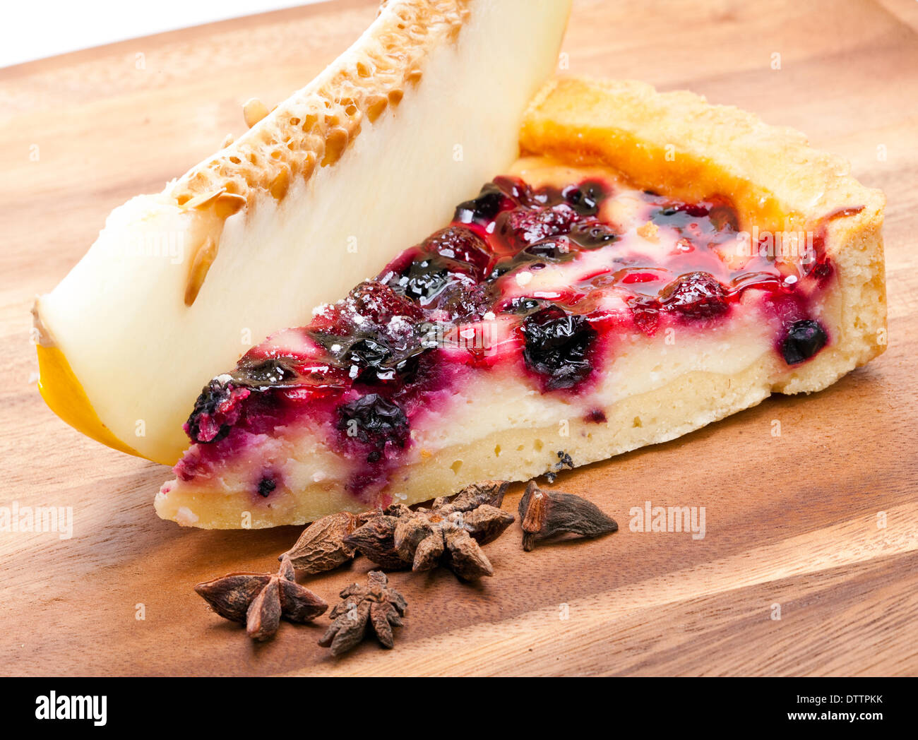 Cheesecake with berries and a fresh melon Stock Photo Alamy