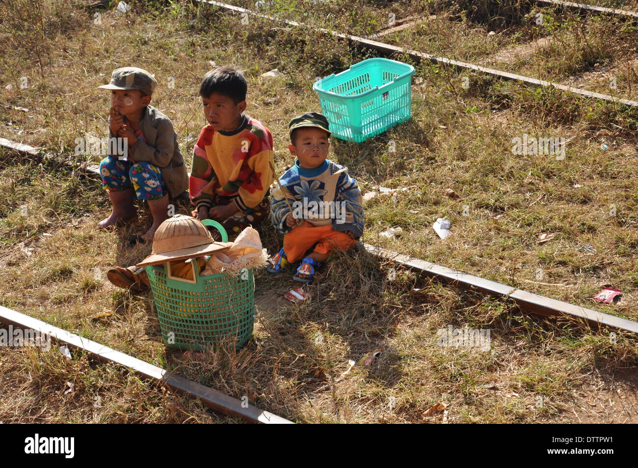 Children sitting on rail hires stock photography and images Alamy