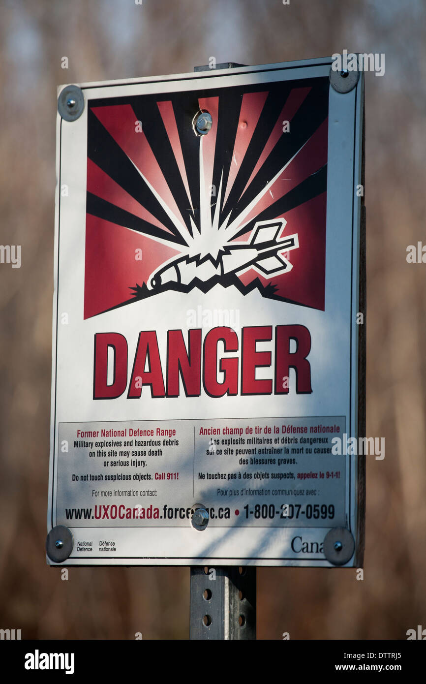 Danger sign warning of unexploded ordnance near Debert, Nova Scotia Stock Photo