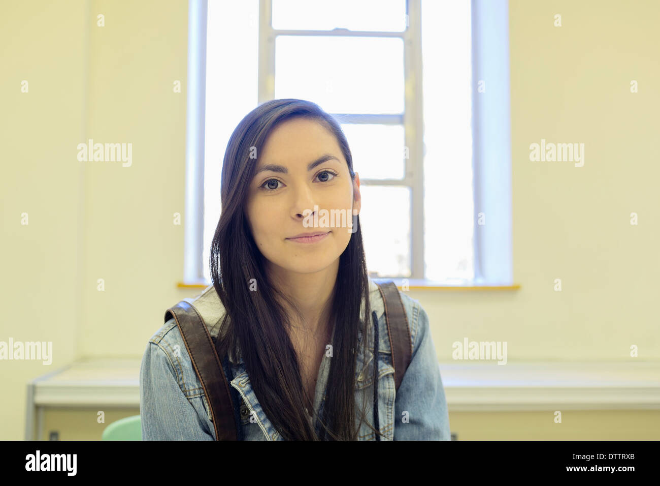 Middle Eastern student sitting in classroom Stock Photo