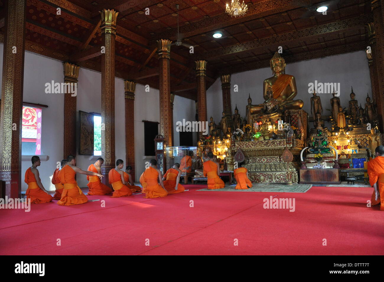 praying monks,luang prabang,laos Stock Photo