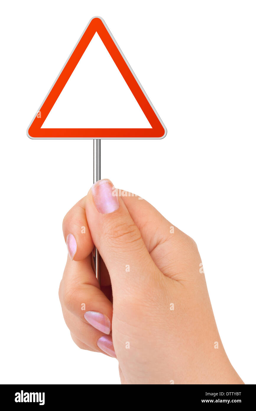 Triangle traffic sign in hand Stock Photo