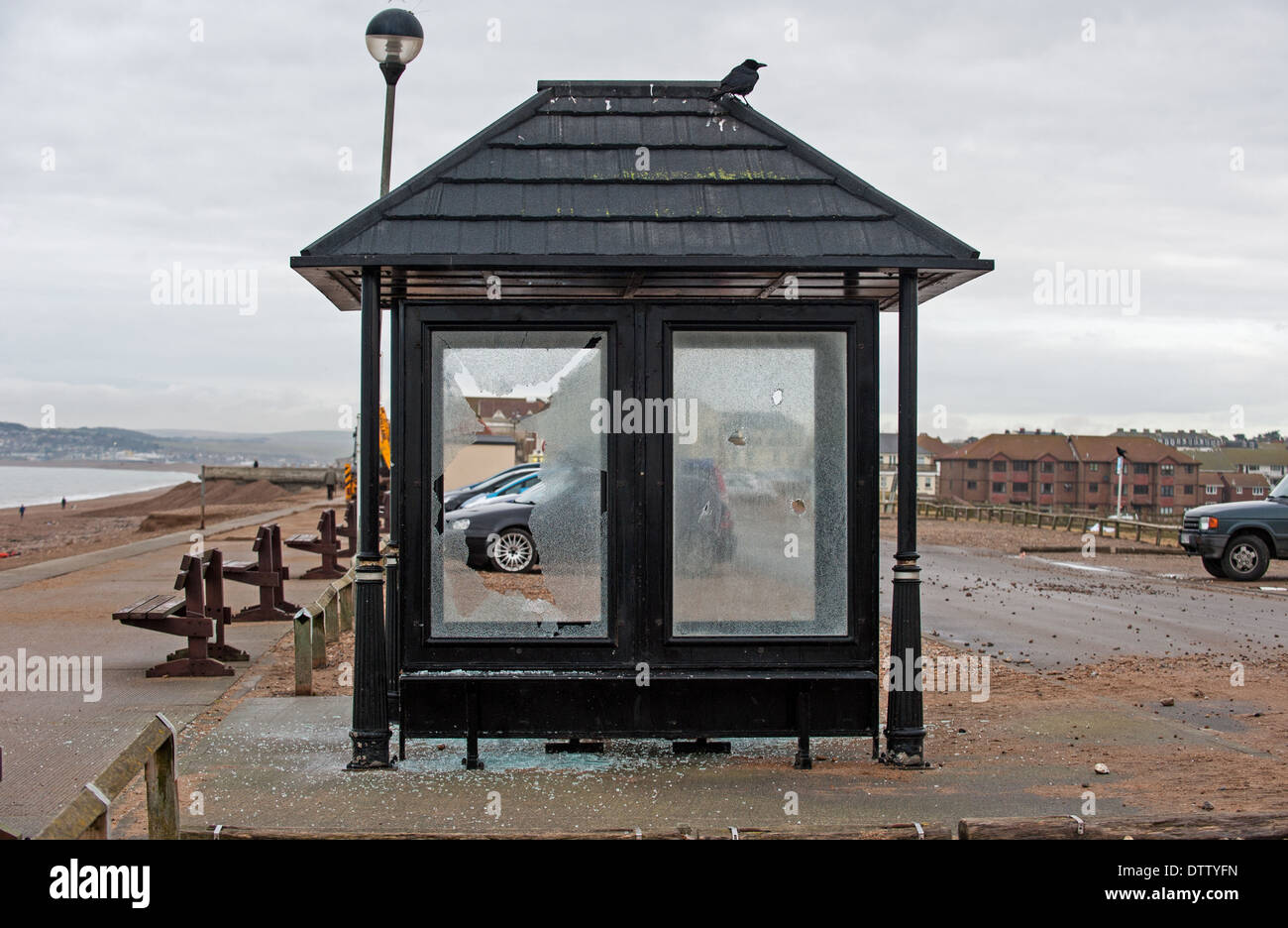 A smashed up bus stop shelter on Seaford seafront Stock Photo