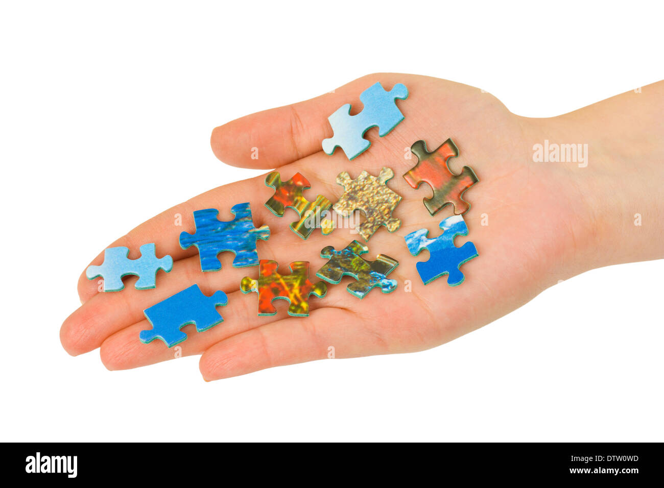 Hand and puzzle Stock Photo - Alamy
