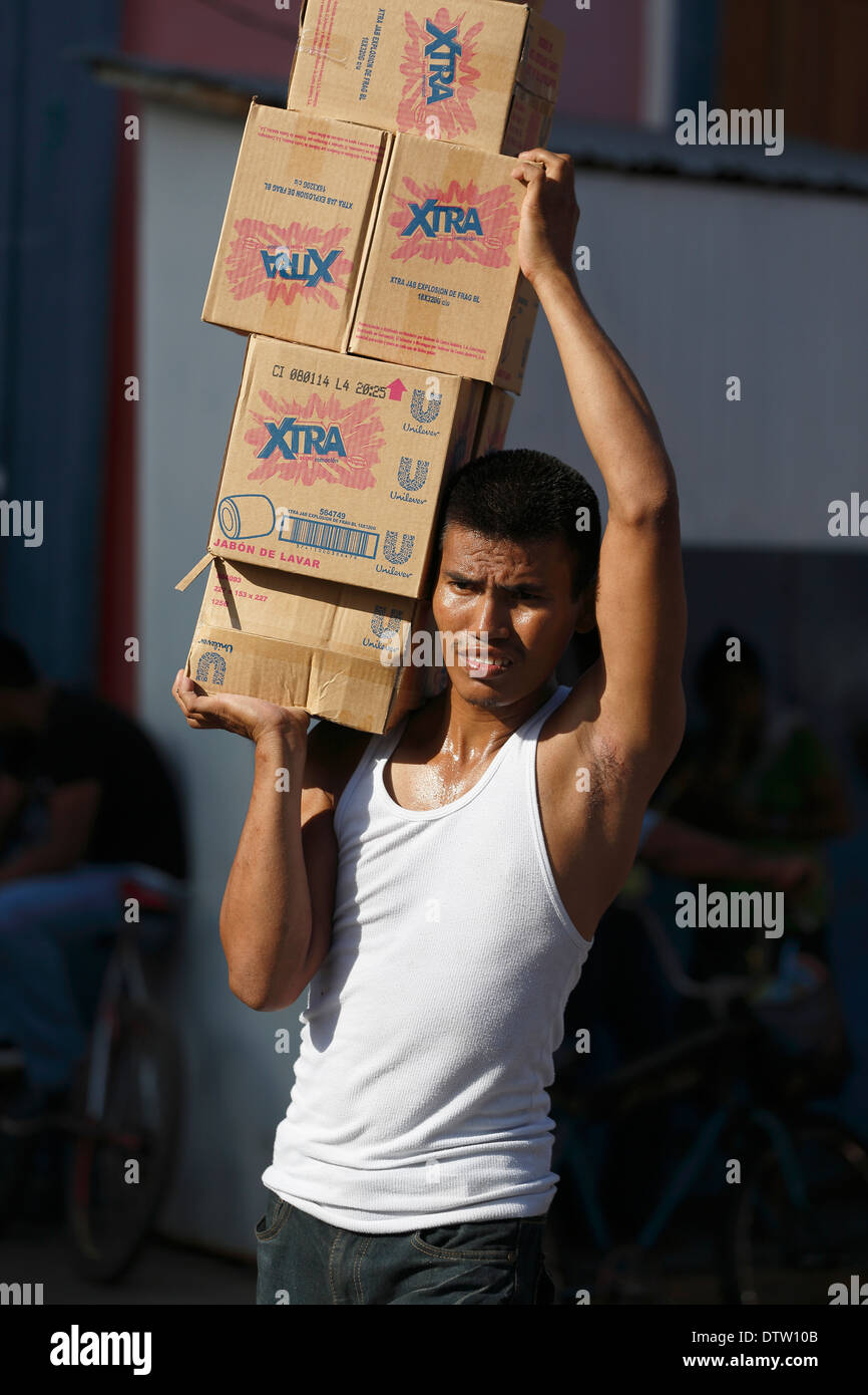 Man delivering boxes, Mercado Municipal, Granada, Nicaragua Stock Photo