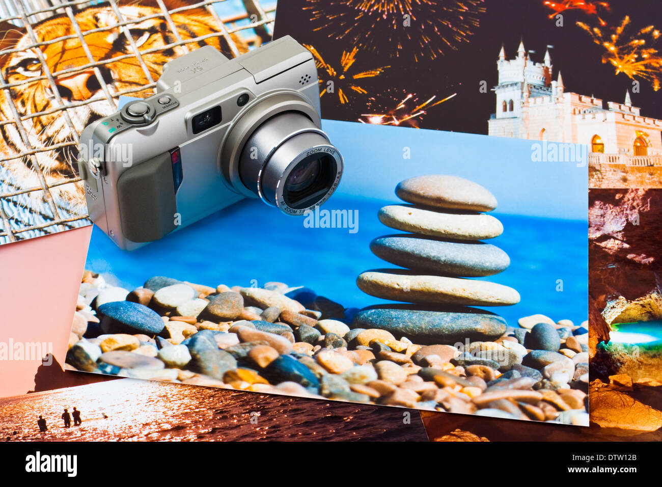 Camera and photo printouts (my photos) Stock Photo