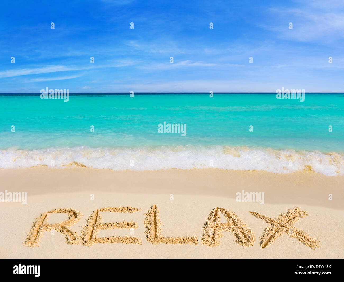 Word Relax on beach Stock Photo