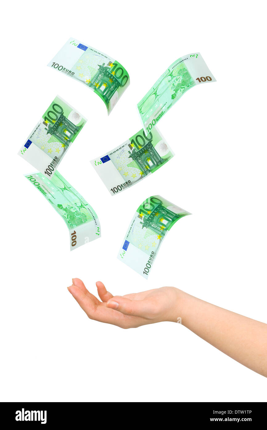 Hand and falling money Stock Photo - Alamy