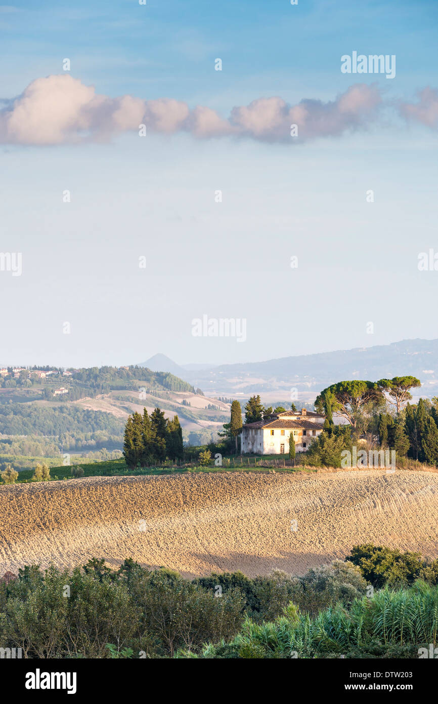 Picture of Tuscany landscape with hills, trees, fields and a house in ...