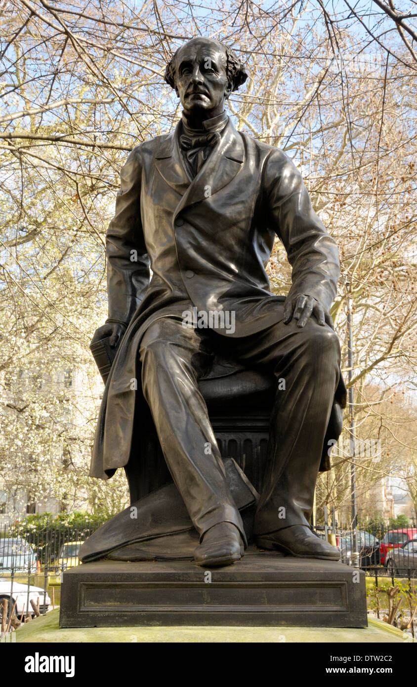London, England, UK. Statue (1878, by John Foley) of John Stuart Mill (1806-1873: economist) in Victoria Embankment Gardens Stock Photo