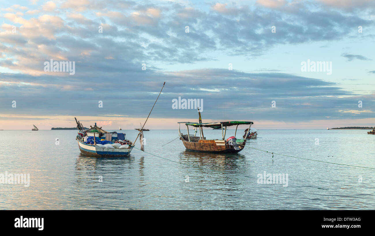 An old wooden boat anchored near the shores of Zanzibar in Tanzania Stock Photo