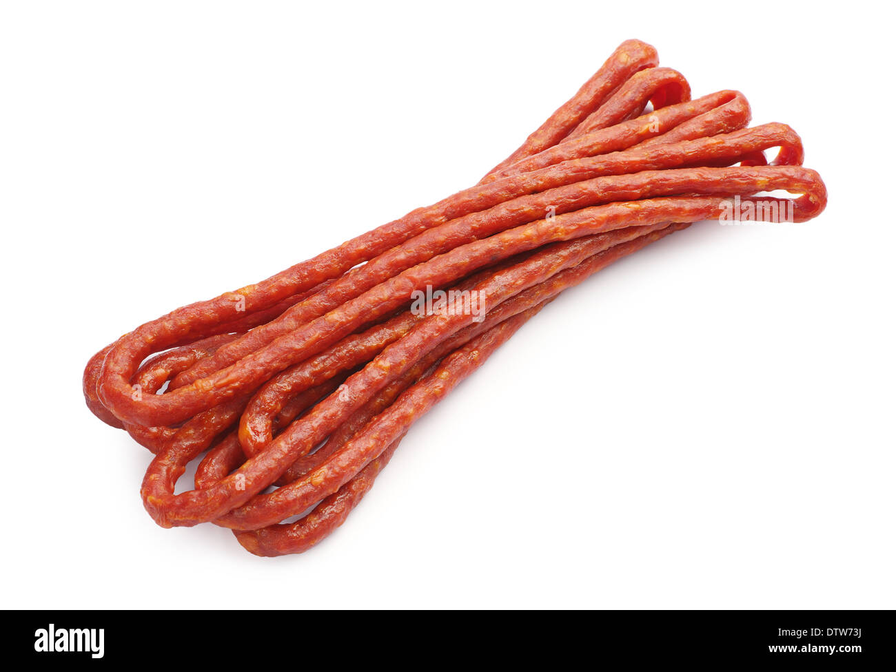 Thin smoked sausage on white background Stock Photo