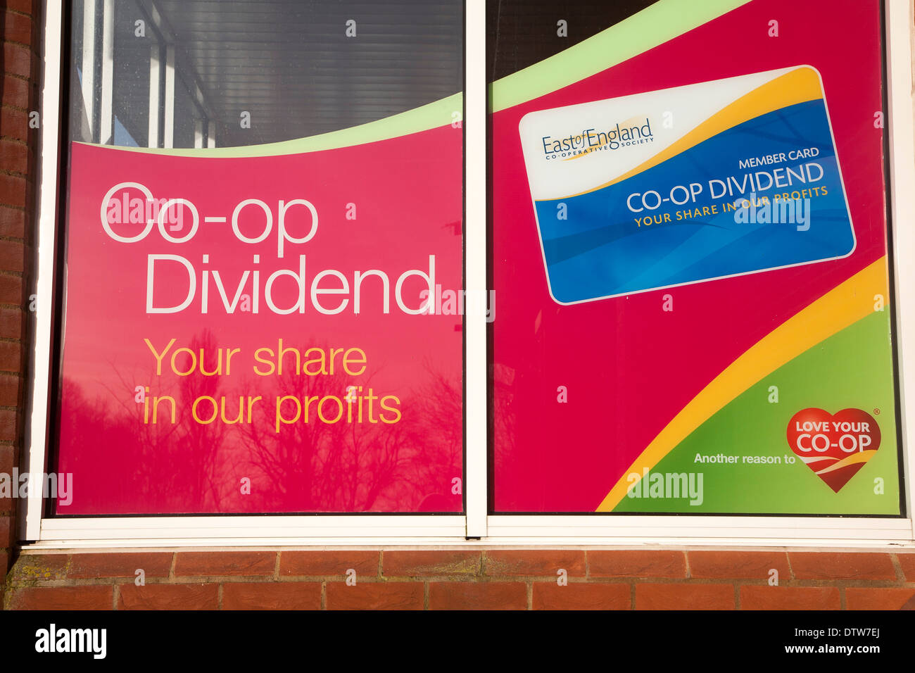 Coop dividend profit share scheme advertised in shop window, East of England Cooperative