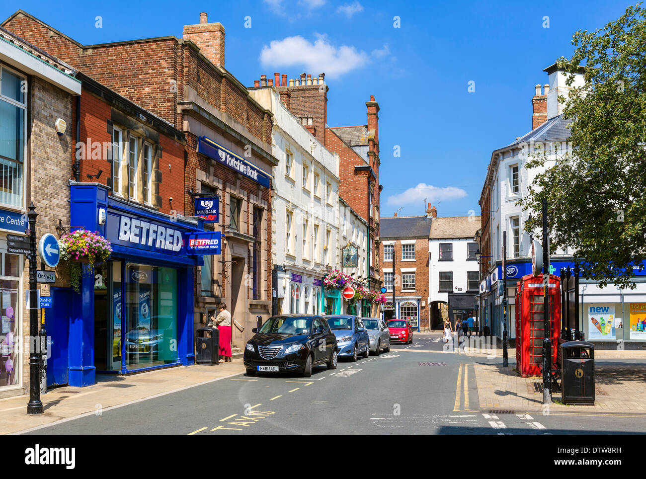 Shops on Market Place in the historic town centre, Knaresborough, North Yorkshire, England, UK Stock Photo