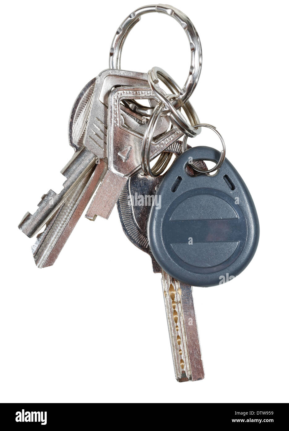 bunch of keys on steel ring and magnetic key isolated on white background Stock Photo