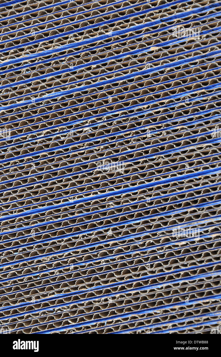 Blue corrugated cardboard stacked Stock Photo Alamy