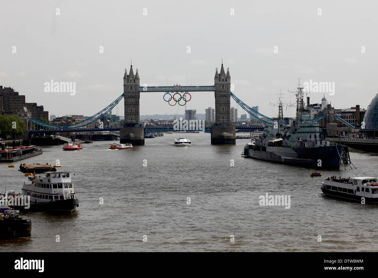 Giant set of Olympic rings are displayed from Tower Bridge on June 27