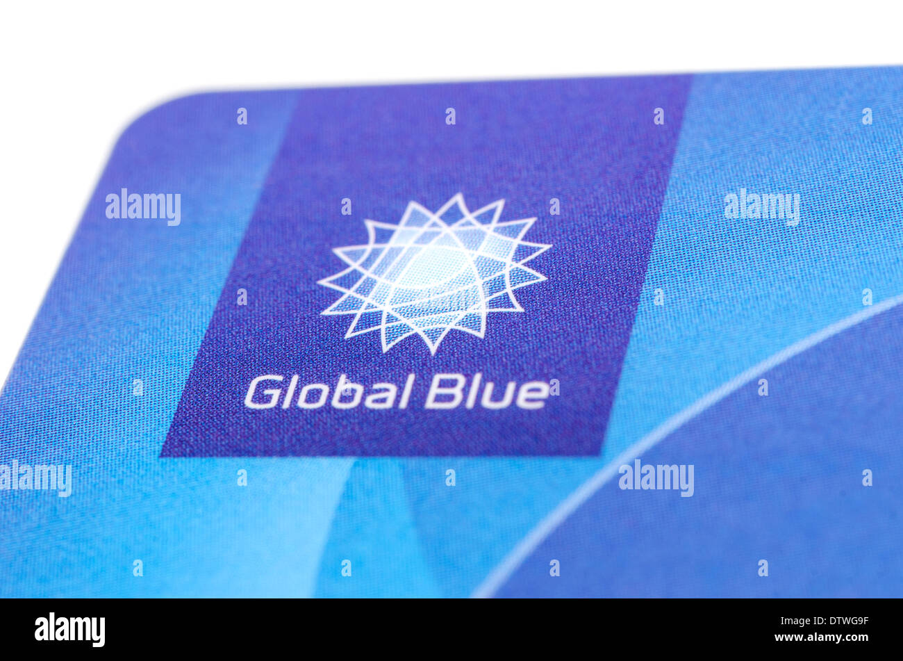 MUNICH, GERMANY - FEBRUAR 20, 2014: Close up corner of plastic card 'Global Blue' with logo this tax free company. Isolated Stock Photo