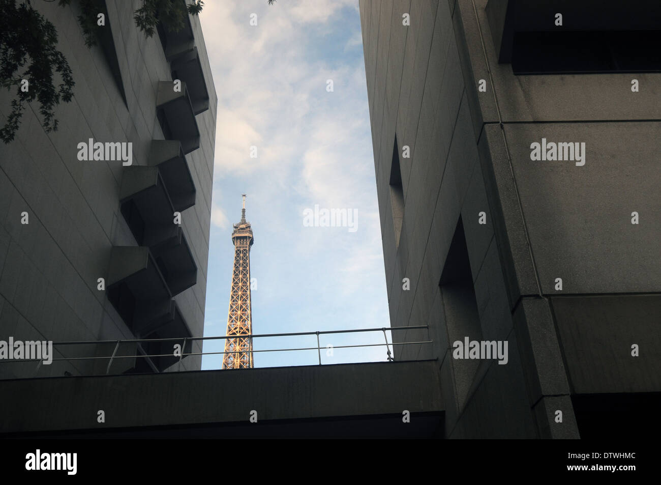 Eiffel Tower glimpsed between Australian Embassy buildings, Paris, France Stock Photo