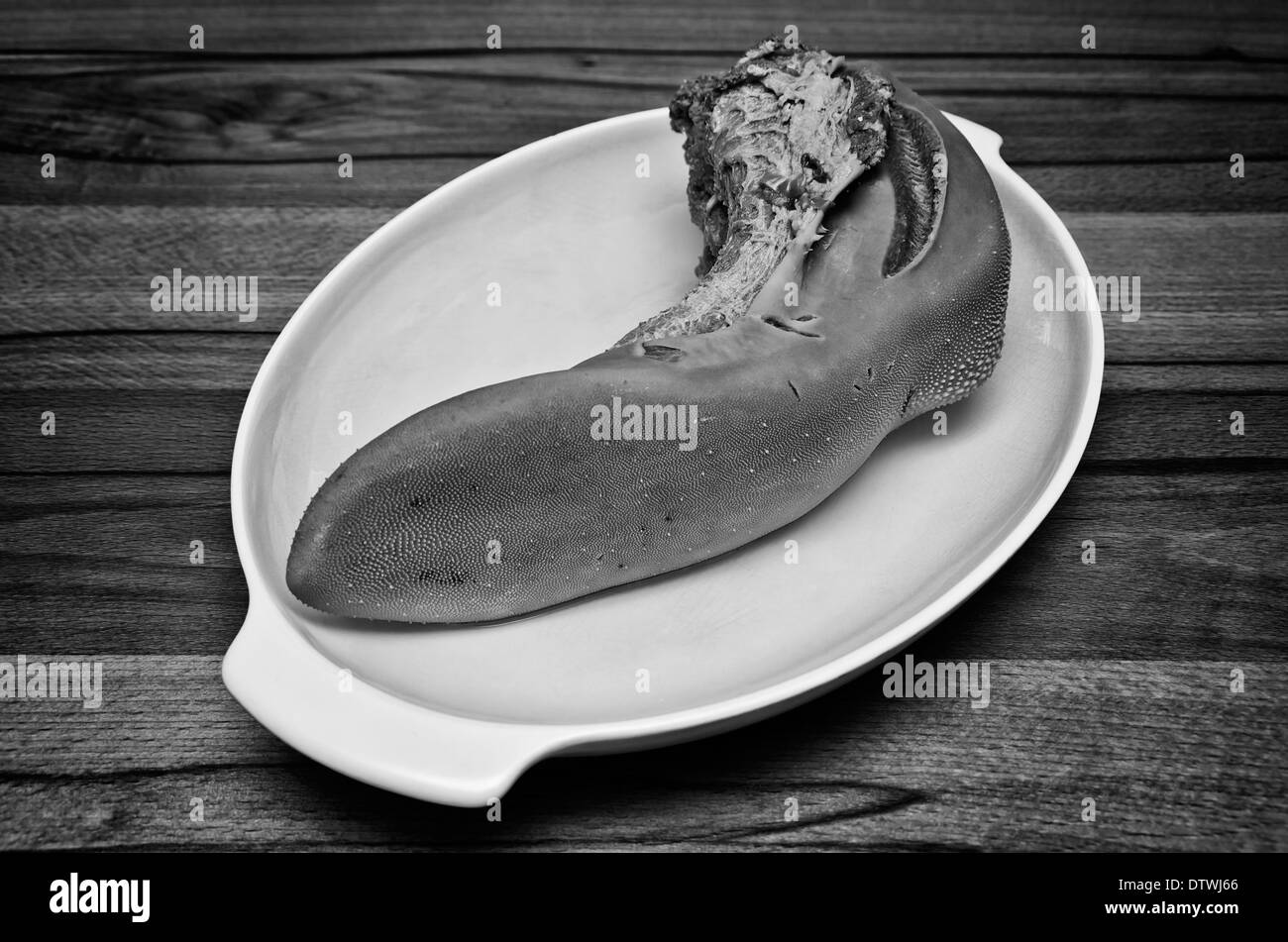 Cured and salted ox tongue. Stock Photo