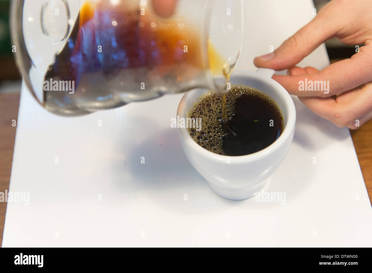 preparation of coffee by barista via pourover method Stock Photo