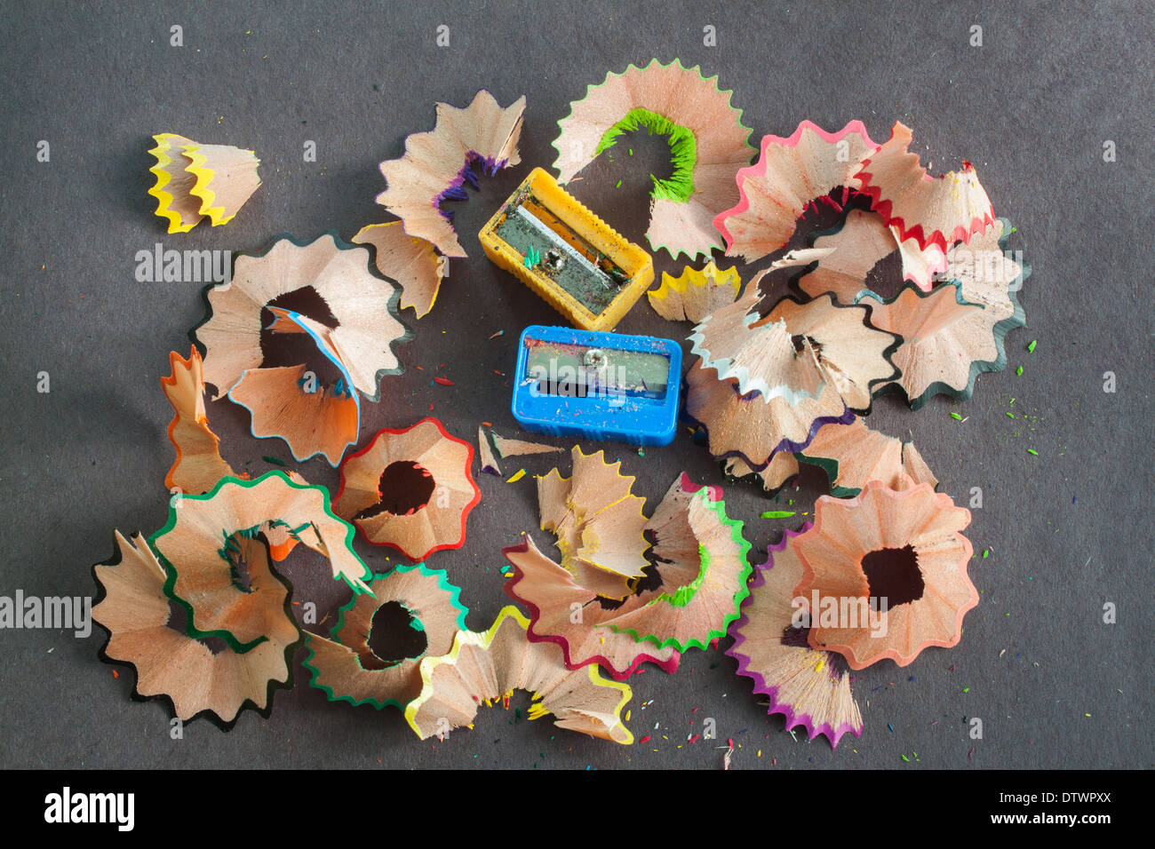 colorful sharpeners trash chips closeup colors colours nobody 'dark background' lifestyle Stock Photo