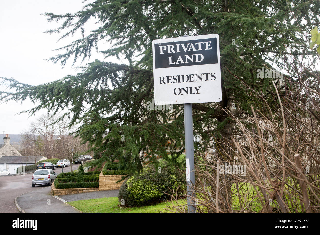 Sign for private land residents access only on suburban residential housing development, Bath, England Stock Photo