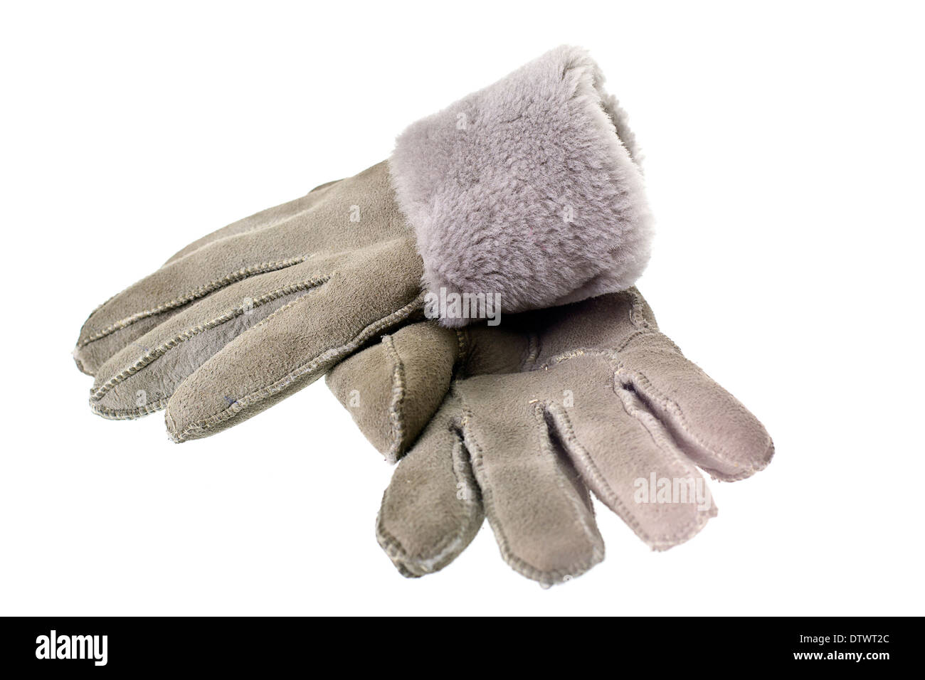 Women's winter fur gloves on a white background Stock Photo