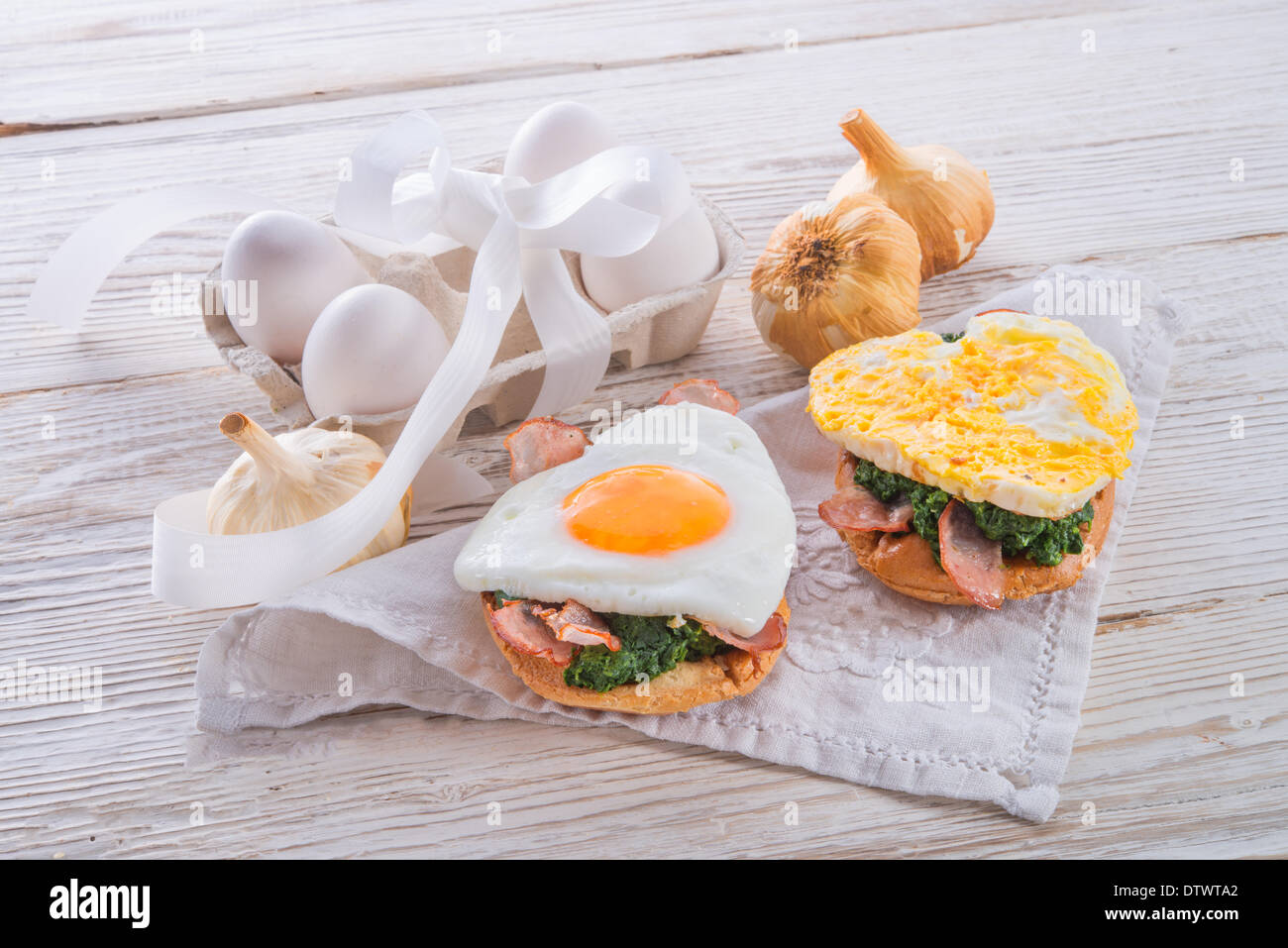 Bread au gratin with fried egg and spinach Stock Photo Alamy