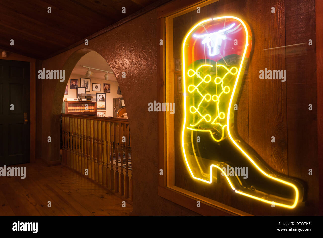 USA, Kansas, Dodge City, Boot Hill Museum, neon cowboy boot Stock Photo