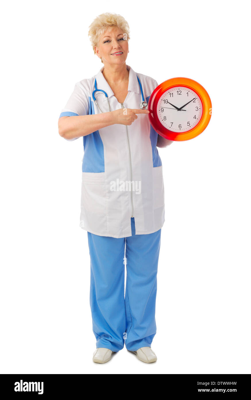 Mature nurse with clock isolated Stock Photo Alamy