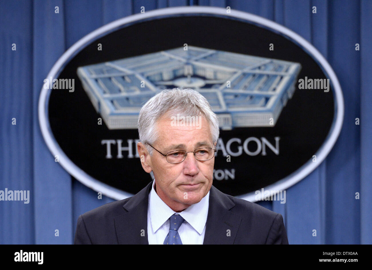 Washington DC, USA. 24th Feb, 2014. U.S. Secretary of Defense Chuck Hagel attends a press conference at the Pentagon, Washington DC, the United States, Feb. 24, 2014. U.S. Defense Secretary Chuck Hagel outlined on Monday his priorities for 2015 defense budget cut, including plans to reduce the size of the U.S. army to its pre-World War II levels. Credit:  Yin Bogu/Xinhua/Alamy Live News Stock Photo