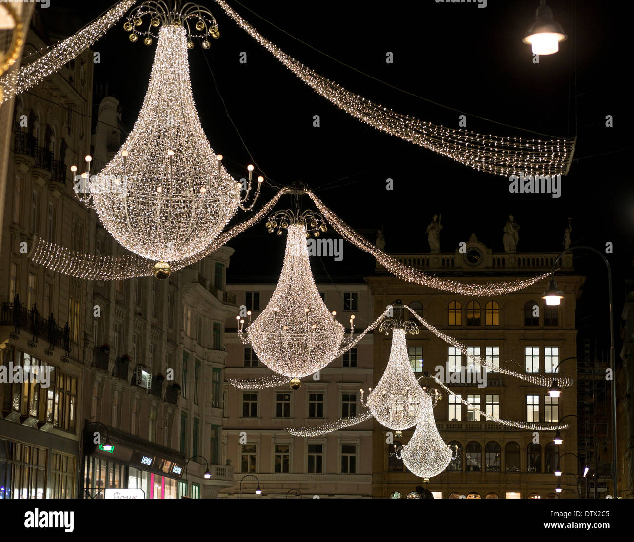 Der Graben Chandeliers. Christmas chandeliers hang high above his famous Vienna shopping street during Advent. Stock Photo