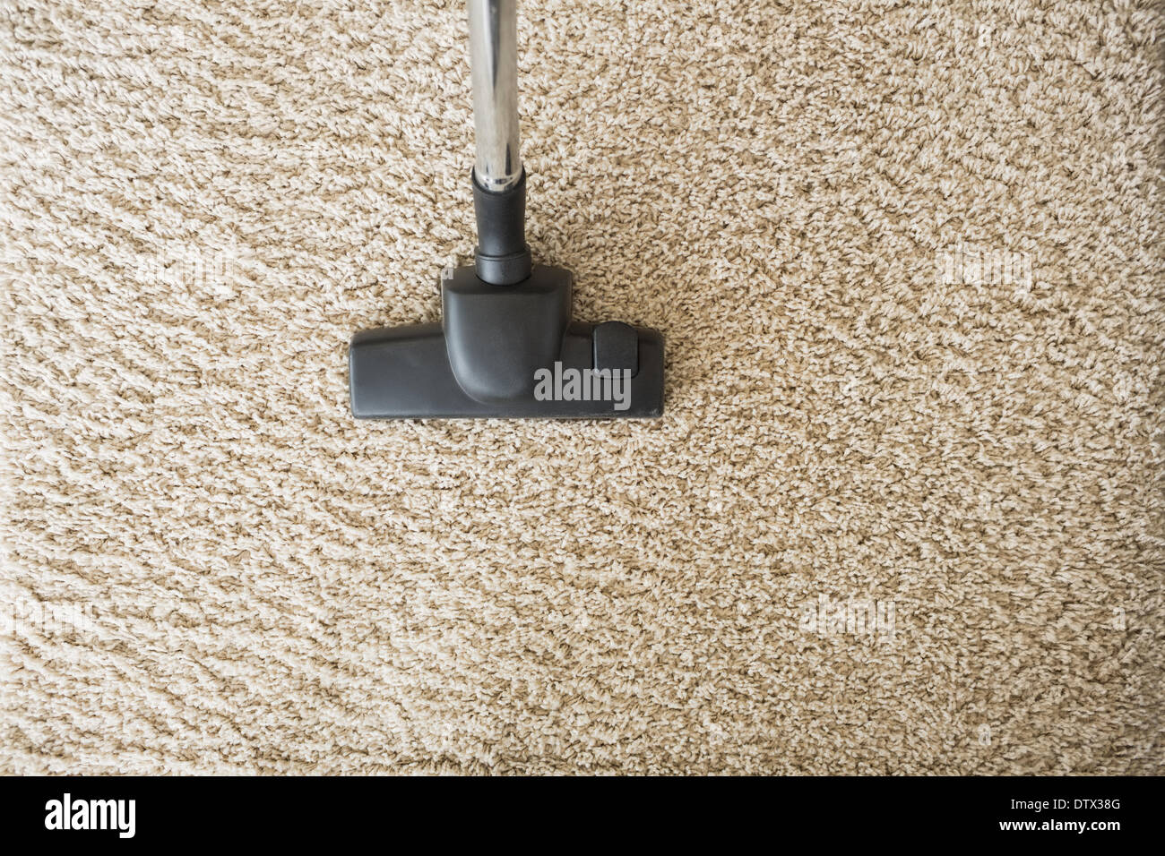 Hoovering the carpet Stock Photo Alamy