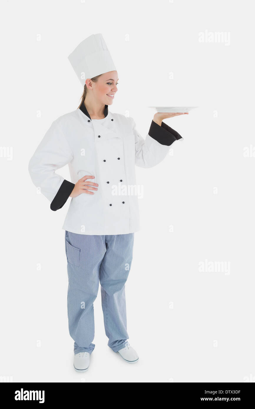 Female chef empty plate hi-res stock photography and images - Alamy